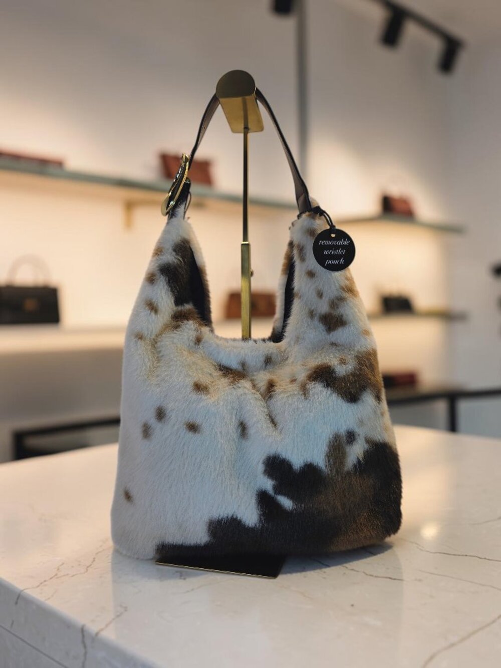 Soft and Cuddly Faux Cowhide Hobo Bag with Brown Detachable Pouch by BCBG NWT